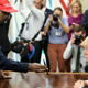 Kanye West , left, shows a picture of a plane to President Donald Trump during a meeting in the Oval office of the White House on October 11, 2018 in Washington, DC.
